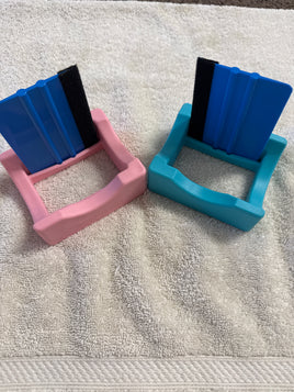 Cup cradle with squeegee