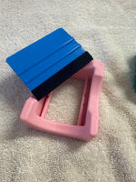 Cup cradle with squeegee