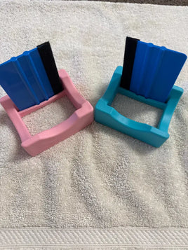 Cup cradle with squeegee