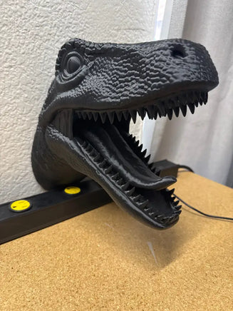 Dino head controller holder
